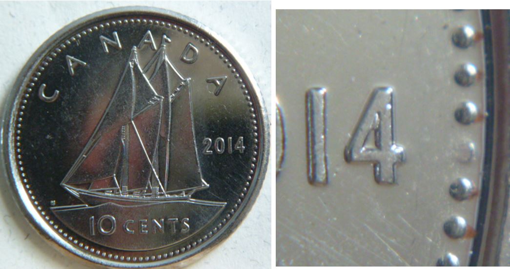 10 Cents 2014-Coin obturé -Une perle devant la date-1.JPG