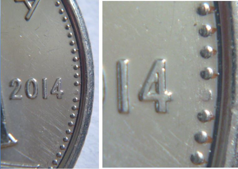 10 Cents 2014-Coin obturé -Une perle devant la date-2.JPG