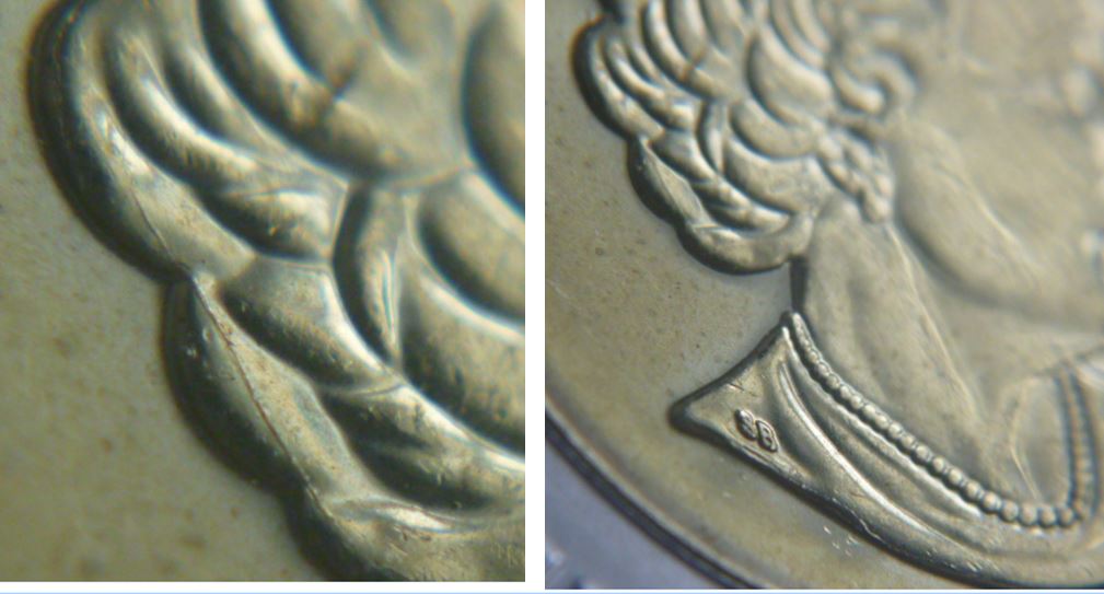 2 Dollar 2019-Coin fendillé sur effigie-2.JPG
