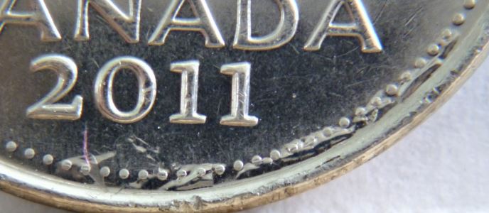 5 Cents 2011-Défaut de flan au revers-2.JPG