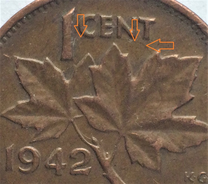 1 cent 1942 entrechoque près haut (3) avec flèches.jpg