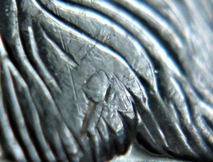 5 Cents 2006 -Défaut patte arrière-2.JPG