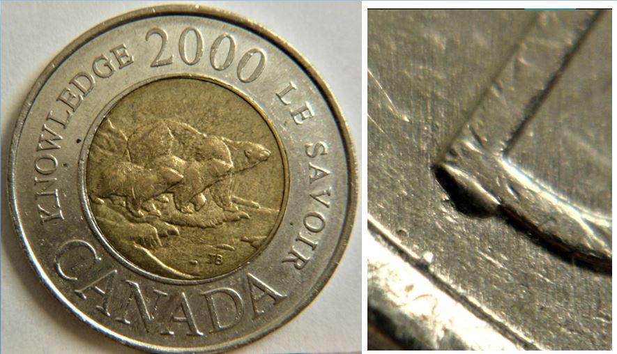 2 Dollar 2000-Éclat coin sous D de Dollar-1.JPG