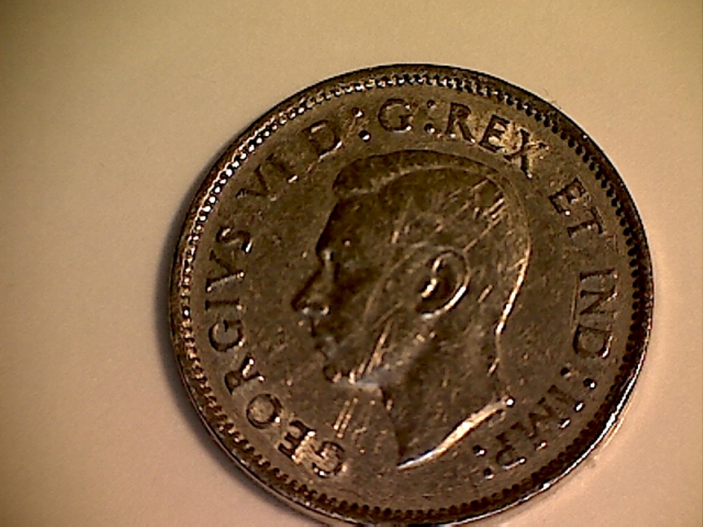 1941 B521021F Coin fendillé et éclat sur feuille de gau. Avers.jpg