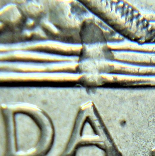 5 Cents 2007-Frappe a travers au dessus A+Accumulation sur la date et lettres-2.JPG