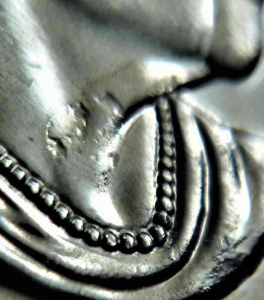 5 Cents 2019-Défaut de flan sur effigie-2.JPG