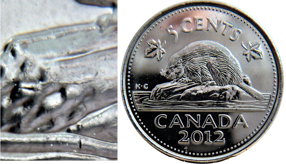 5 Cents 2012-Coin fendillé sur le devant la buche et le dos du castor-1.JPG