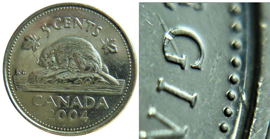 5 Cents 2004-dommage du coin à travers G de reGina-1.JPG
