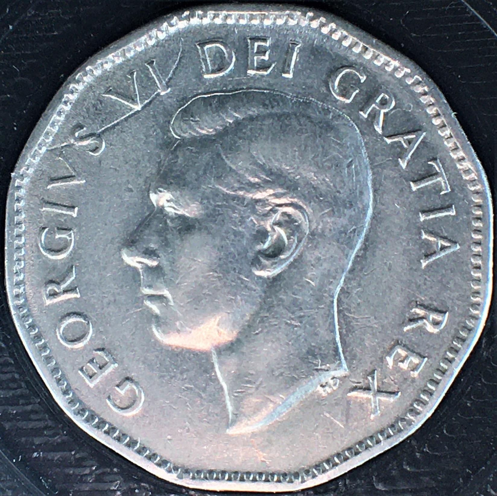 5 cents 1951 avers frappe à travers.jpg