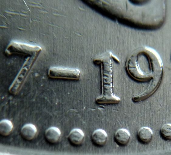 25 Cents Saskatchewan 1867-1992-Dommage du coin au 1 de 1992-3.JPG