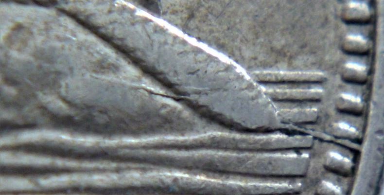 5 Cents 1985-Coin fendillé à la du castor-2.JPG
