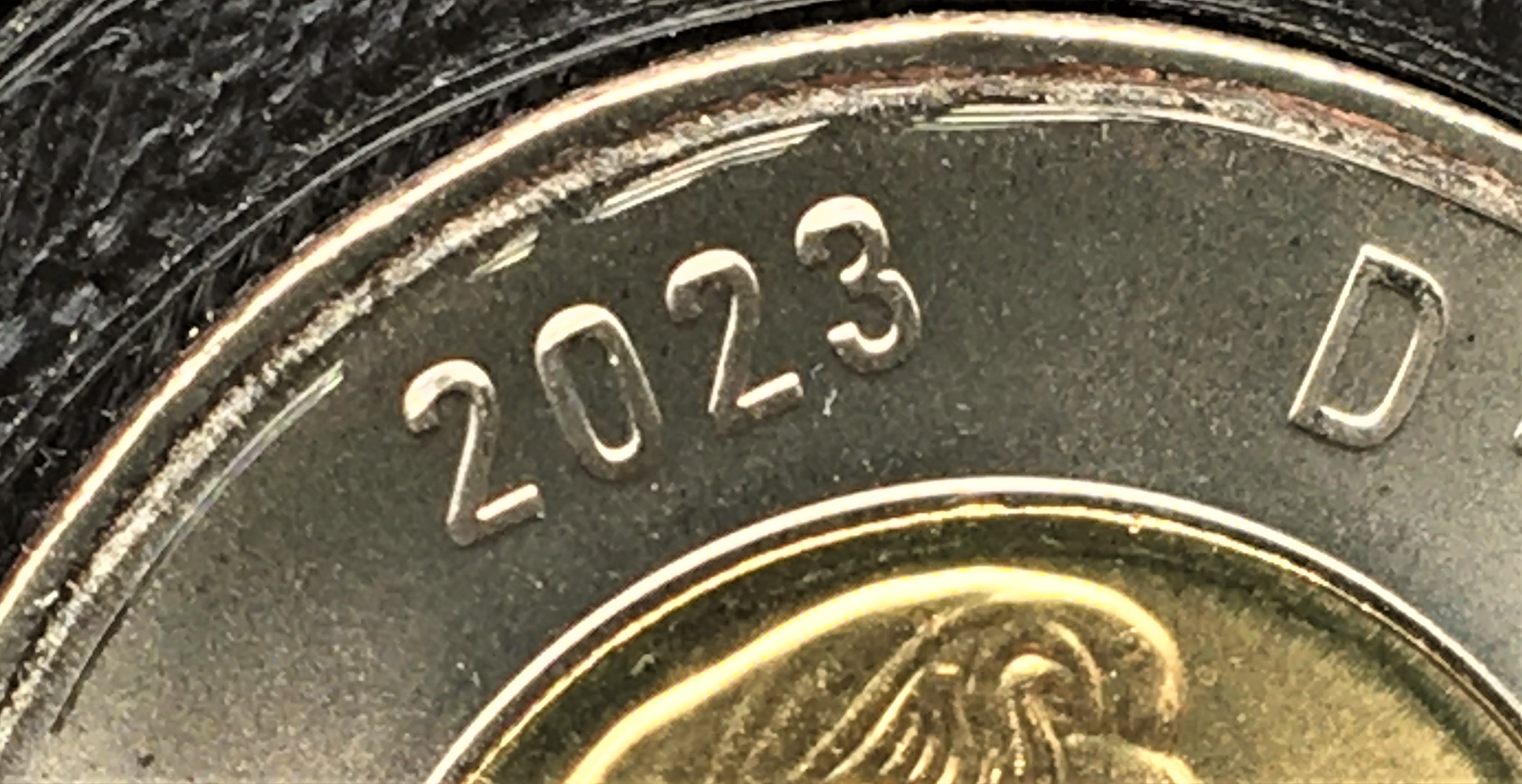 Lignes de machinage 2 dollars haut.jpg