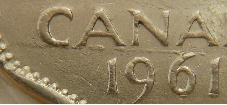 5 Cents 1961-Éclat coin sous 61-Défaut de placage sous CAN-3.JPG