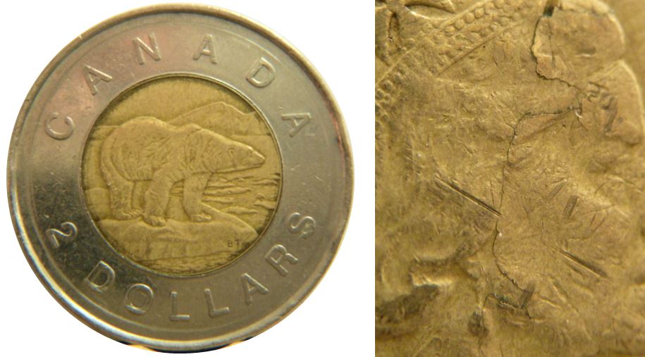 2 Dollars 1996-Défaut de placage coté avers-2.JPG