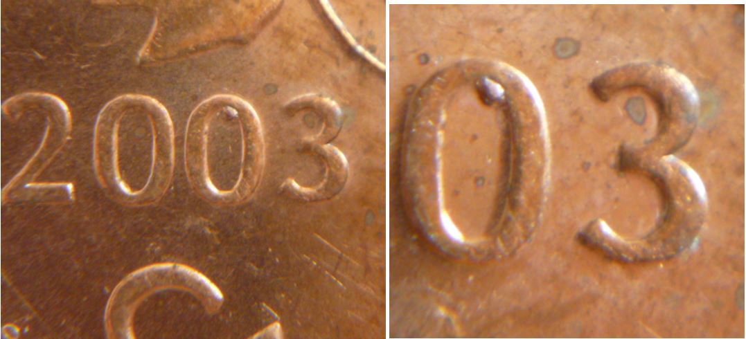 1 Cent 2003- Éclat de coin dans 2 sixième 0 de la date.JPG