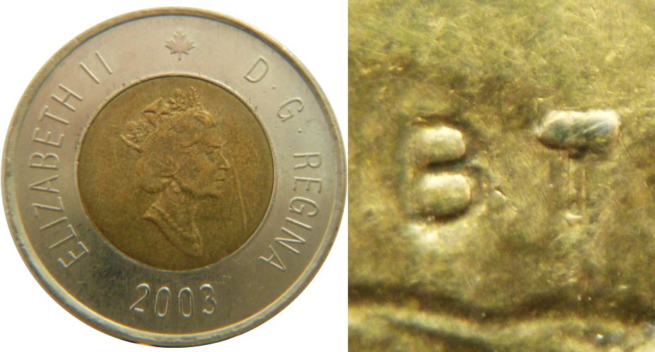 2 Dollars 2003-Éclat coin sur T de b T-No.2,.JPG