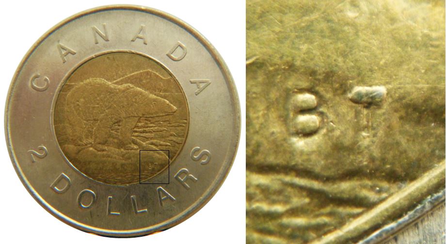 2 Dollars 2003-Éclat coin sur T de b T-No.2.JPG