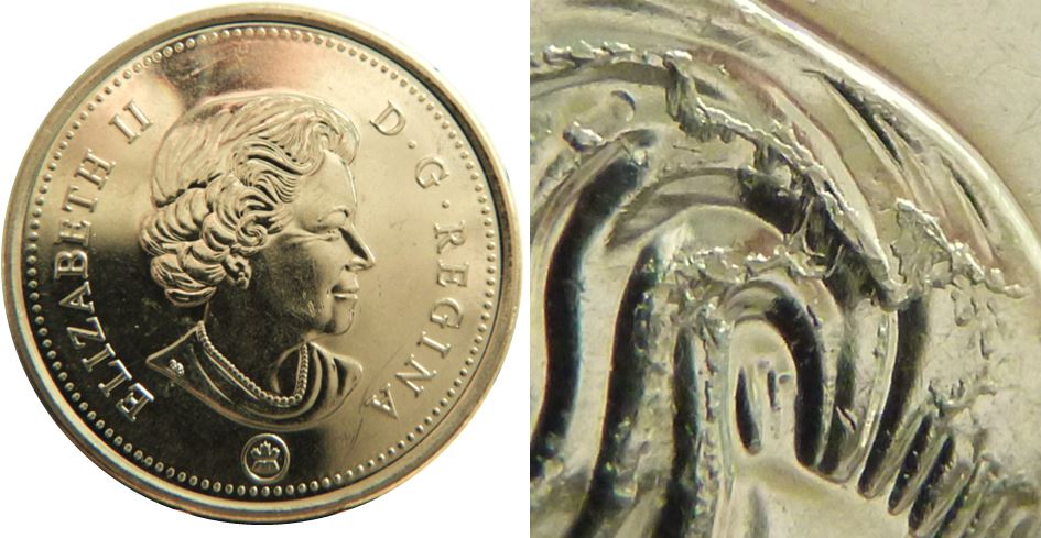 25 Cents 2022-Accumulation excessif sur la tête de effigie-1.JPG