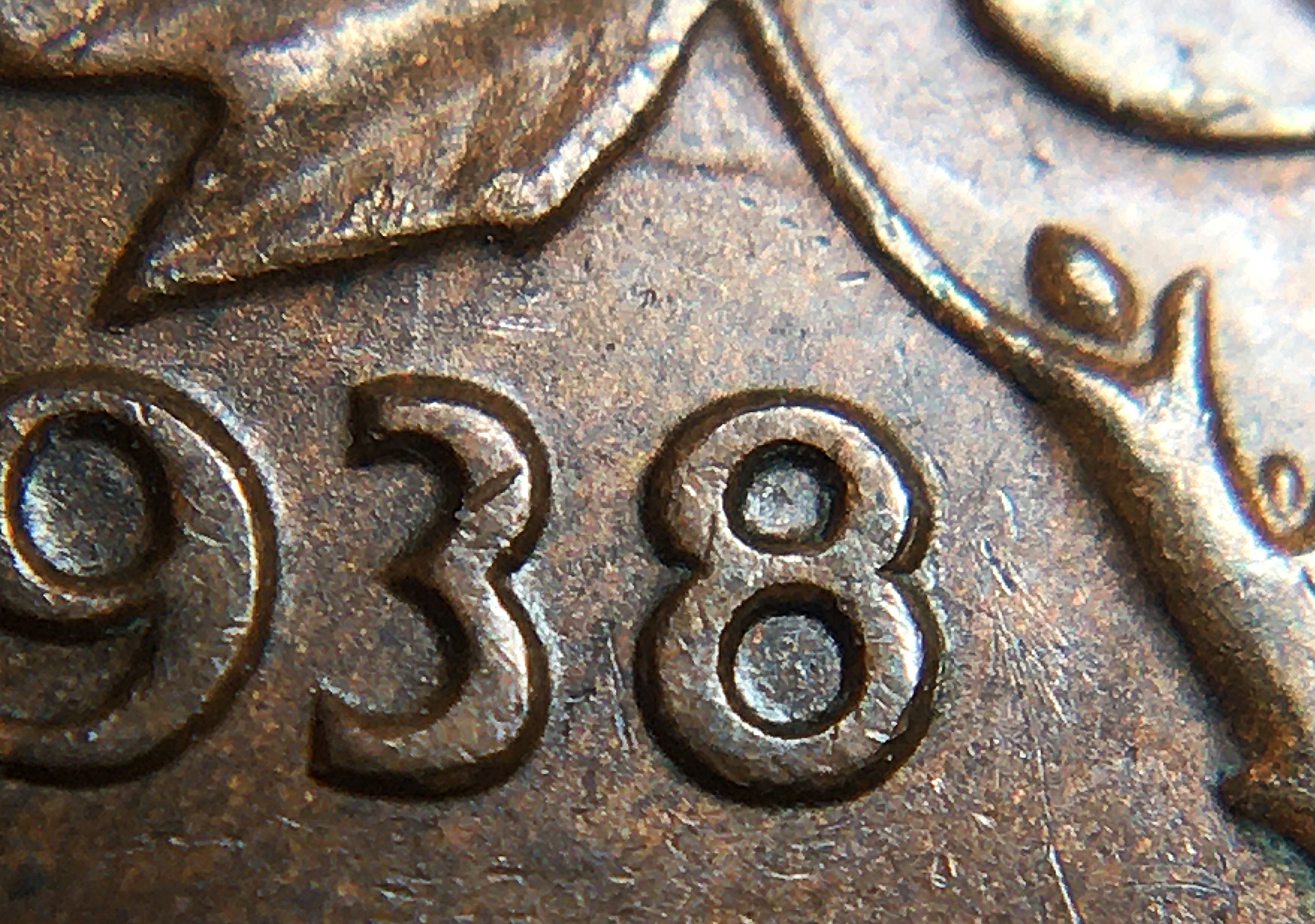 1 cent 1938 double 8 et hanging.JPG