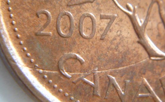 1 Cent 2007-Frappe a travers un fils-3.JPG