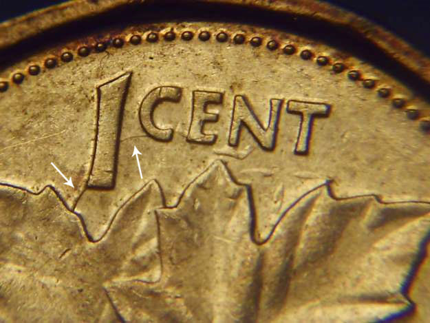 Coins And Canada 1 Cent 1995 Canadian Price Guide Values 180 1 Cent 1995 Clashes On The Obverse Near