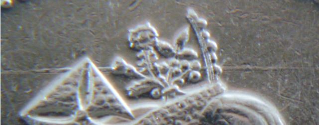 10 Cents 1999-Dommage du coin a travers la Couronne-3.JPG