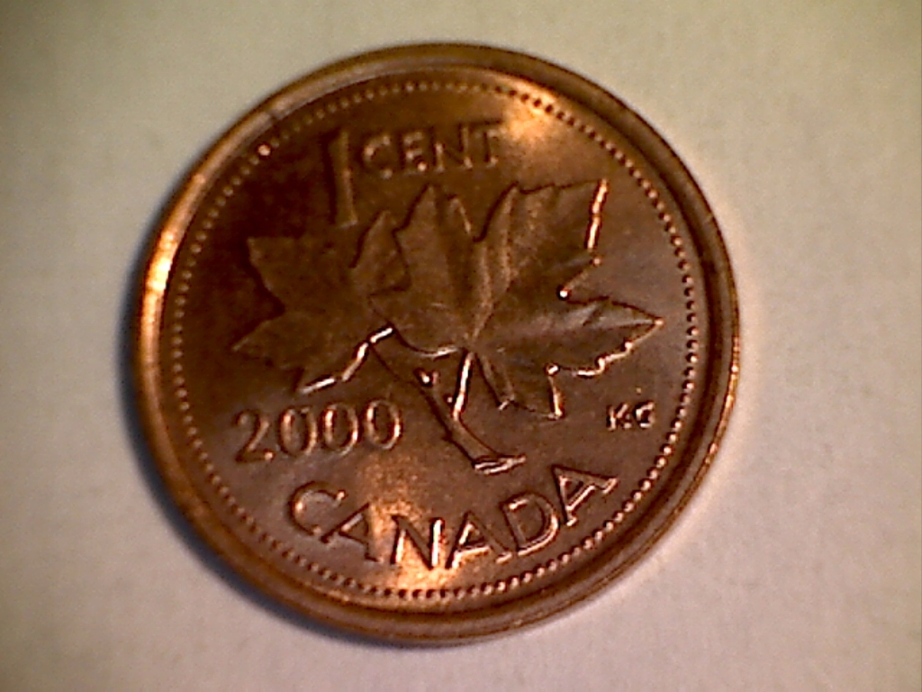 2000 Dééfaut de coin sur la joue et sous menton B019149A Revers.jpg