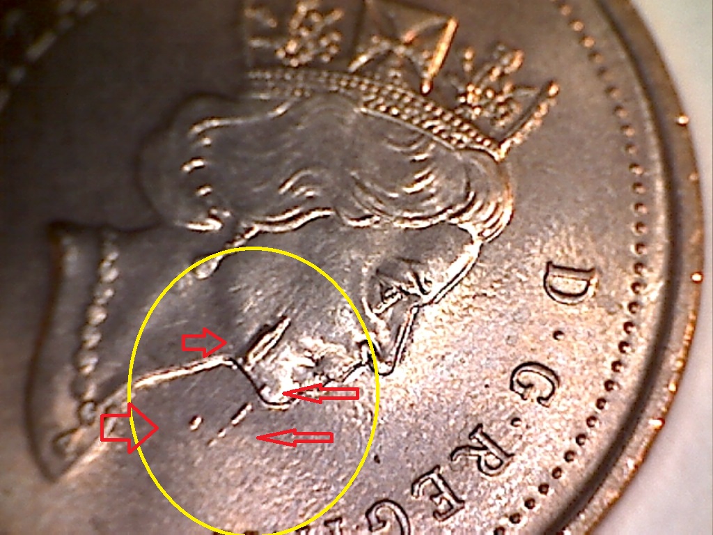 2000 Dééfaut de coin sur la joue et sous menton B019149A.jpg