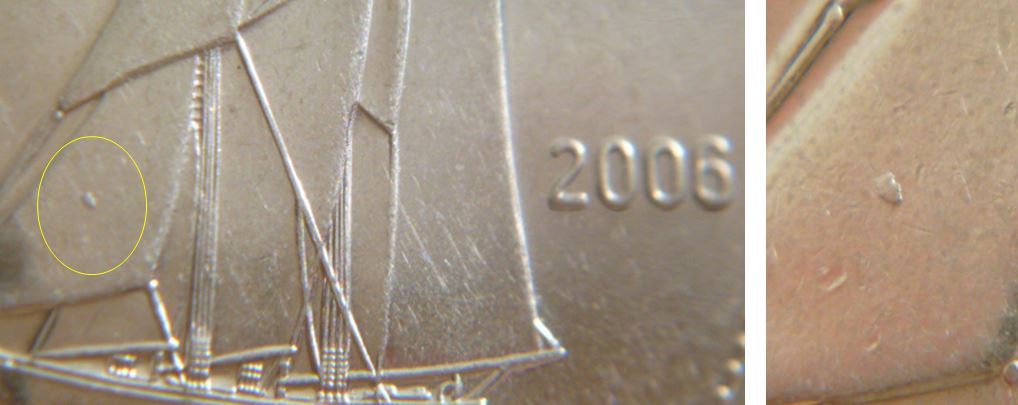 10 Cents 2006-Éclat de coin sur première voile.JPG
