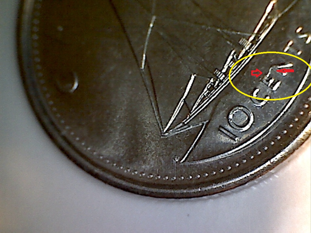 2008 Stries Avers, Fendillé entre E et N et éclat dans C de CANADA B120040B 2 de 3.jpg