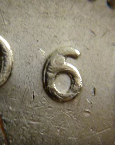 25 Cents 2006-Éclat du coin dans le 6-3.JPG