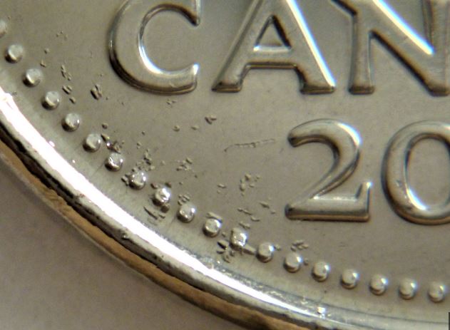 5 Cents 2019-Accumulation sur le revers-2.JPG
