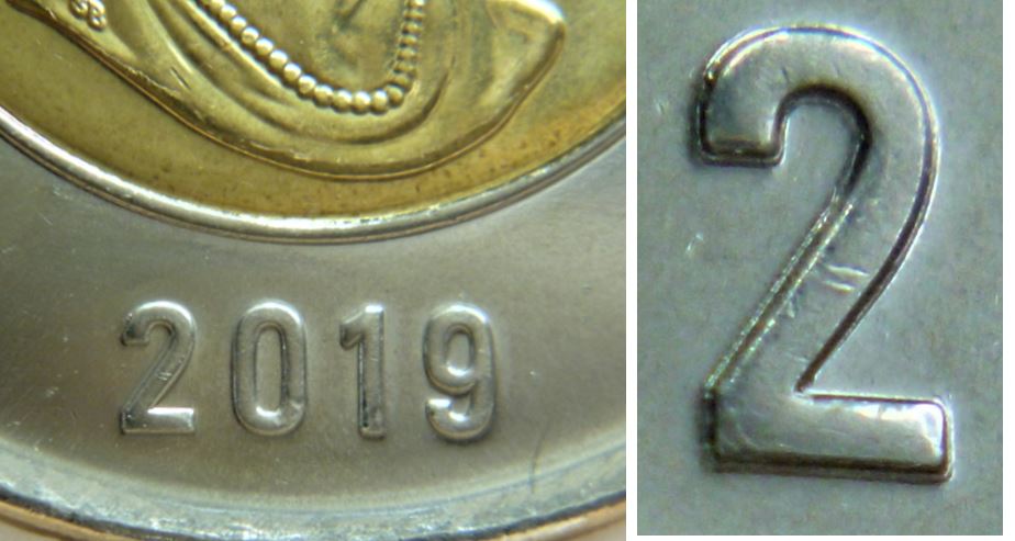2 Dollar 2019-Double date-Coin détérioré-1.JPG