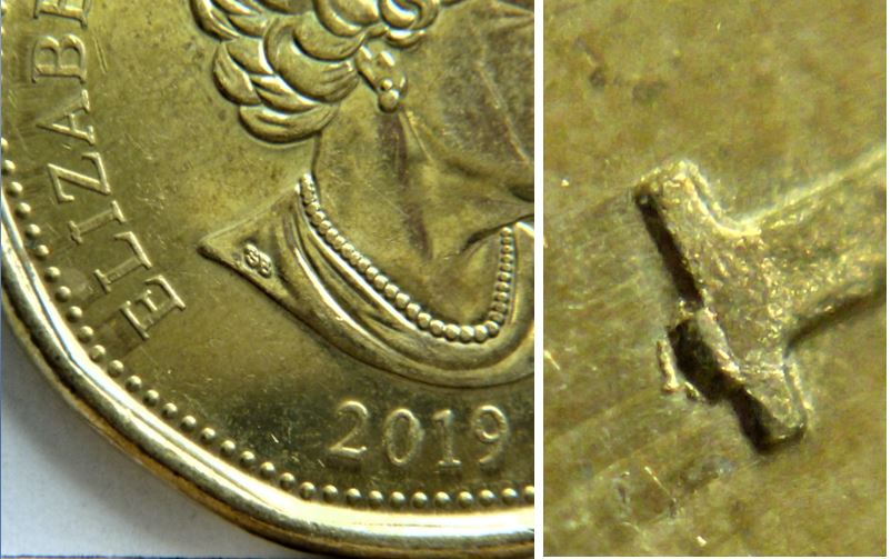 1 Dollar 2019-Éclat du coin sur I de elIzabeth.JPG