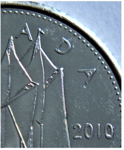 10 Cents 2010-Éclat du coin au revers A A 0-1.JPG