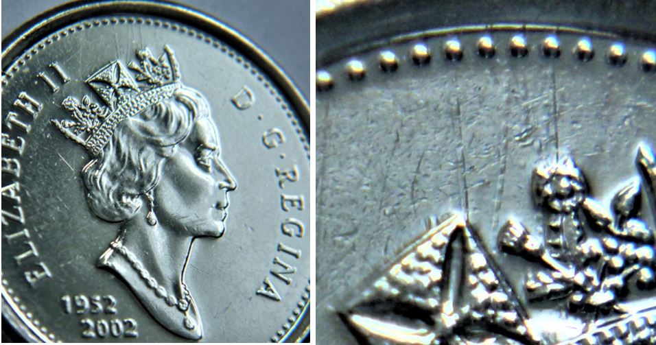 10 Cents 2002-Dommage du coin au dessus de la couronne.1.JPG
