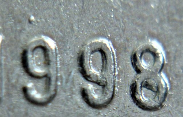 10 Cents 1998- Point au dessus du prenier 9 et Éclat coin dans le 98 -2.JPG