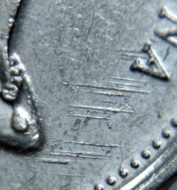 10 Cents 1999- 17 Lignes devant l'effgie-3.JPG