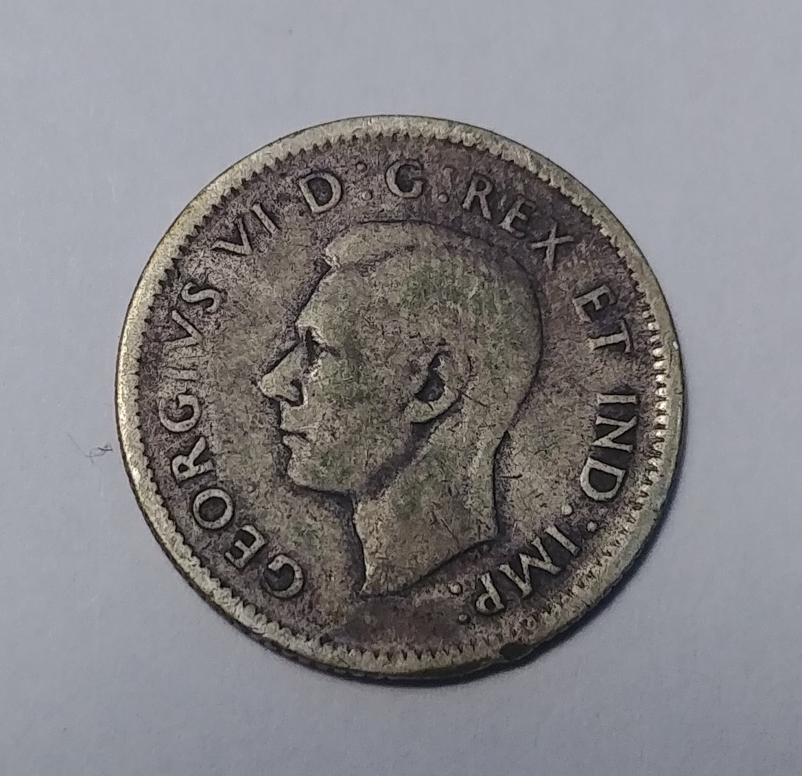 10 cent 194- face.jpg