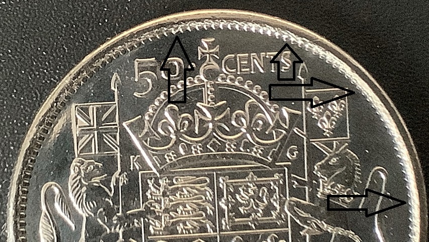 50 cents 2021 revers détails 2 avec flèches.jpg