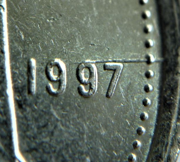 10 Cents 1997-Coin fendillé au dessus de la date-2.JPG