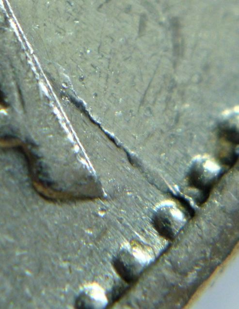 5 Cents 1977-Coin fendillé sur le coté du dernier A canadA-2.JPG
