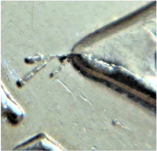 5 Cents 2016-Coin fendille sous l'effigie vers le L ,1.JPG