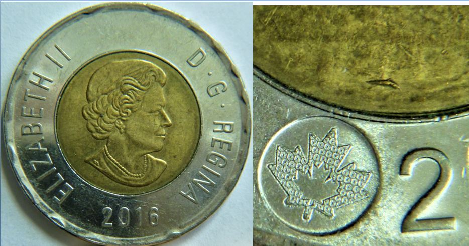 2 Dollar 2006-Éclat coin près du deux-1.JPG