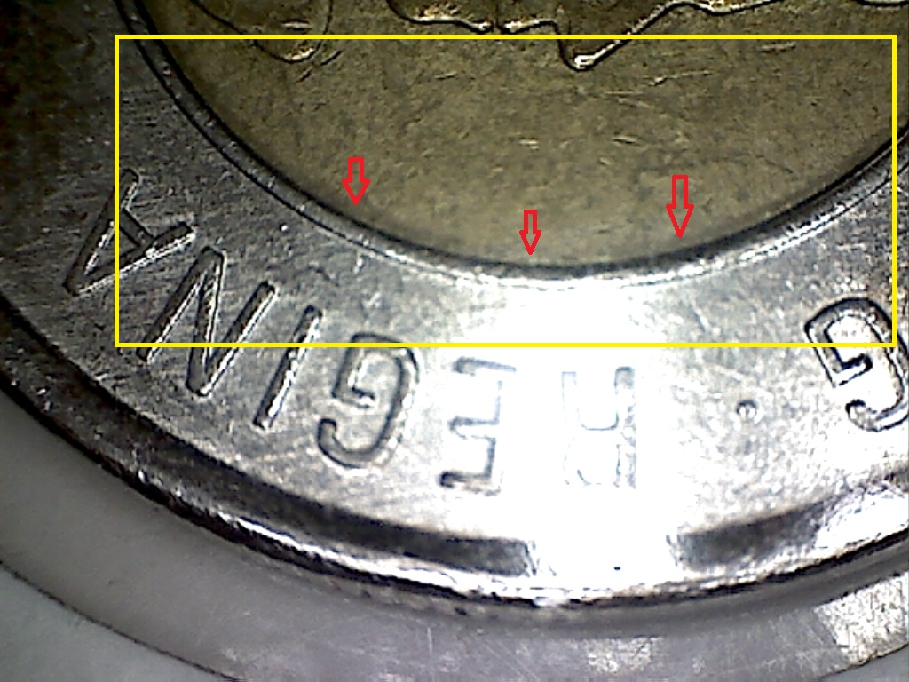 2011 B22107D Coin décentré 2 de 4.jpg