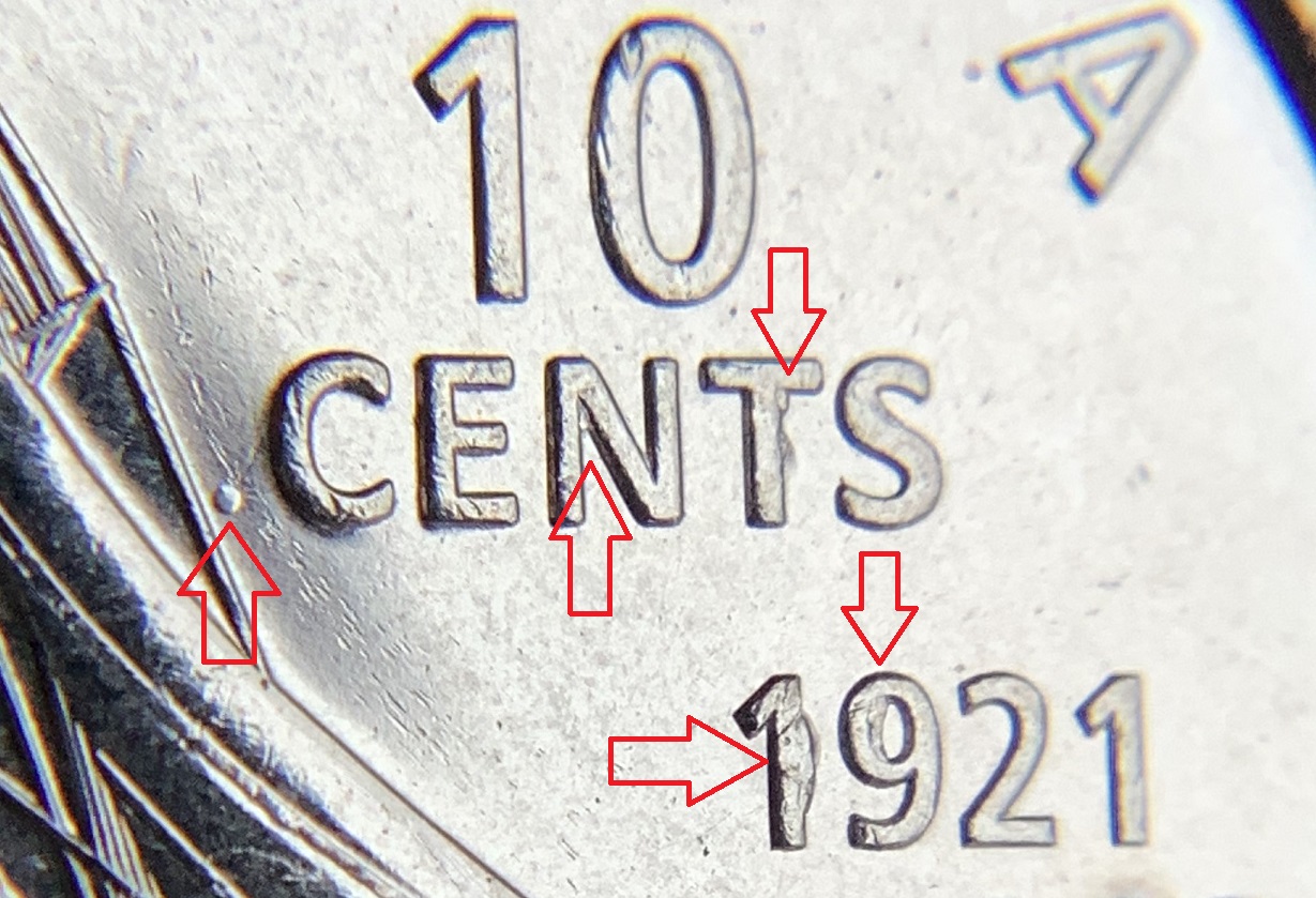 10 cents 2021 dot et extra métal avec flèches.jpg