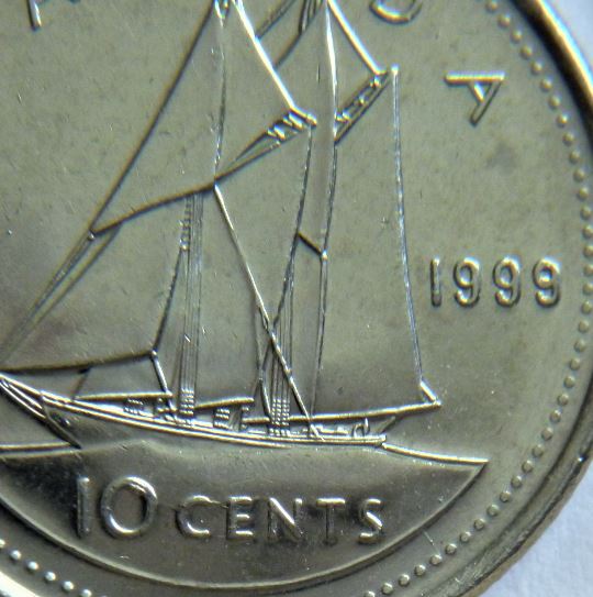 10 Cents 1999-Éclat coin dans O et coin fendillé O CE-1.JPG
