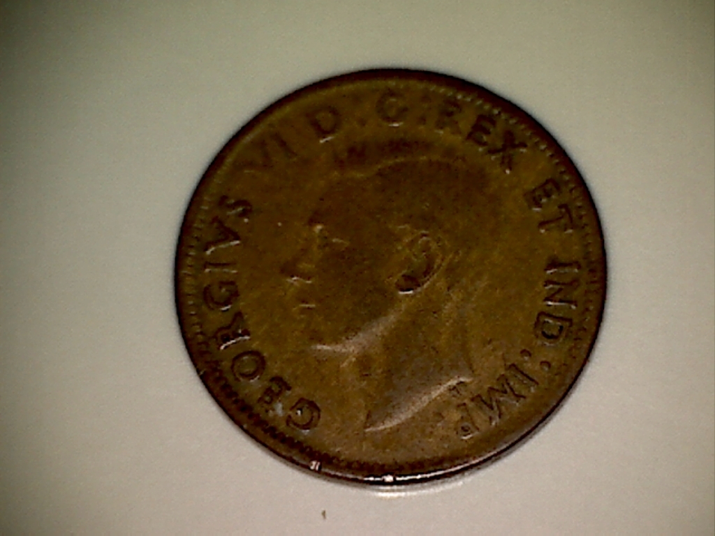 1943 Coin obtu. au revers, frapp. faible CAN. et sur VI JD547 Avers.jpg