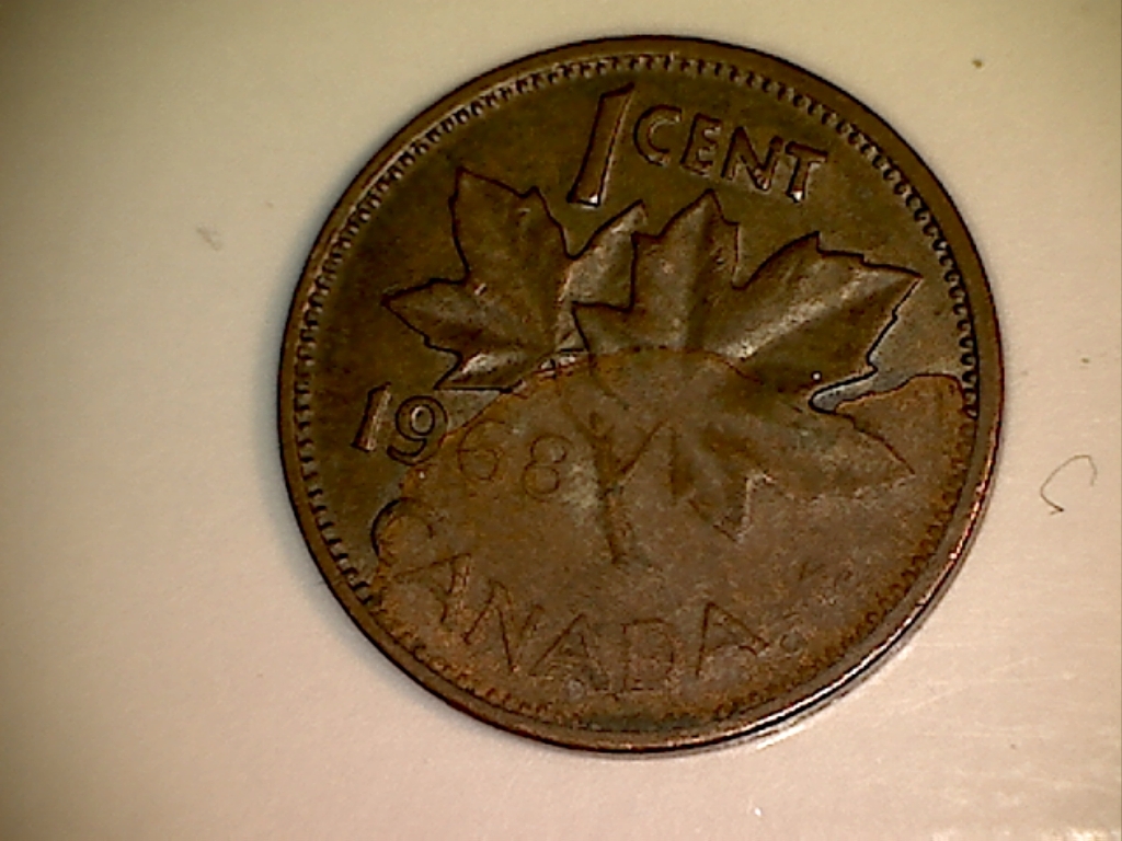 1968 Coin endommagé JD457 Revers.jpg