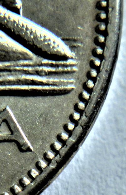 5 Cents 1964-Bavure sur listel au revers+Dépôt de métal au tour de la queue -2.JPG